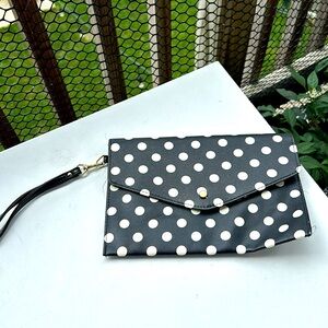 10” by 7” envelope polka dot purse. No name brand